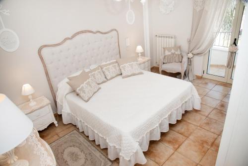 Katil atau katil-katil dalam bilik di La luce nel pozzo