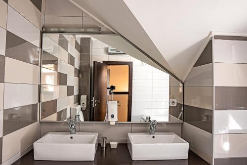 Een badkamer bij Pleasure Čair apartments