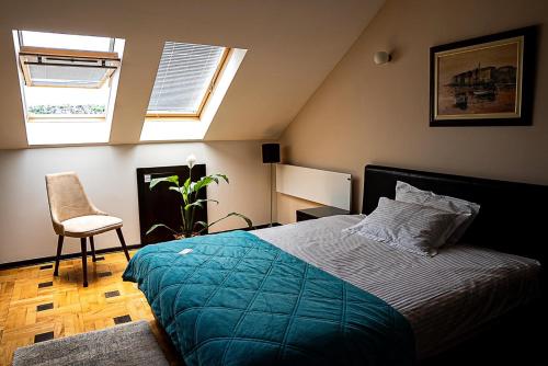 Una cama o camas en una habitación de Pleasure Čair apartments