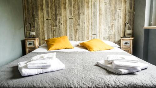 Ένα ή περισσότερα κρεβάτια σε δωμάτιο στο ApartHotel Le Sirene - CHALET