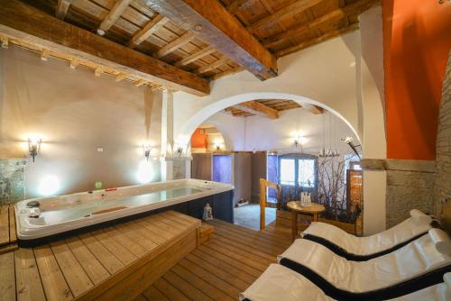 Posezení v ubytování HG Abetone e Piramidi Resort