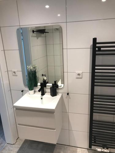 Ένα μπάνιο στο Apartment St Mauritz Souterrain