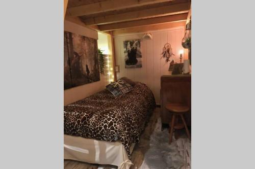 En eller flere senge i et værelse på Cocon de la Vallée d'Ossau , Véritable Havre de paix - 4 à 6 pers