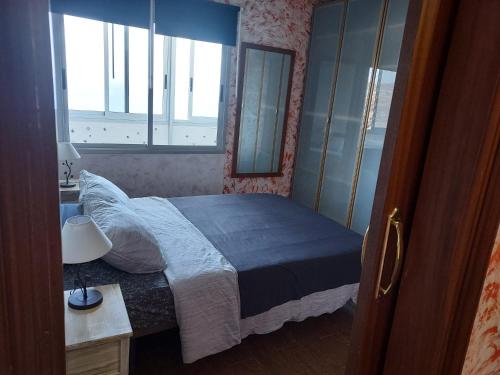 Katil atau katil-katil dalam bilik di Apartment on the beach and ocean sounds