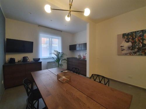 TV a/nebo společenská místnost v ubytování Charme Rooms Siracusa