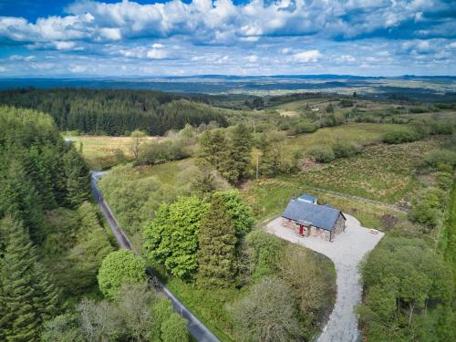 an overhead view of a small house in a field at Glenkeel Cottage in Manorhamilton