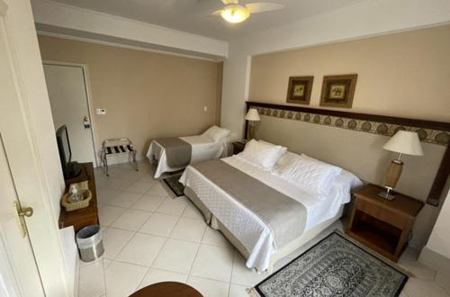 Ένα ή περισσότερα κρεβάτια σε δωμάτιο στο Hotel Firenze