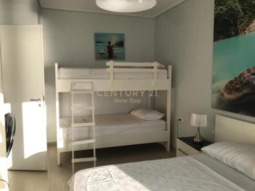 Ένα ή περισσότερα κρεβάτια σε δωμάτιο στο Sea View Apartment