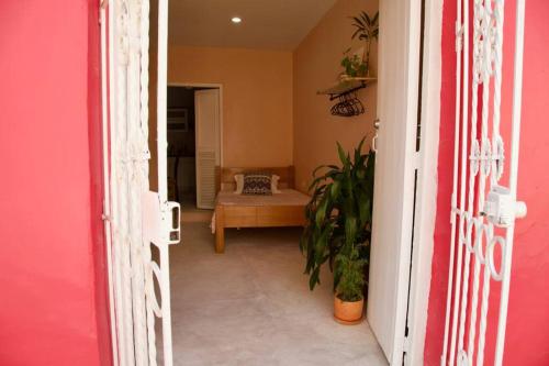 Postel nebo postele na pokoji v ubytování GREAT LOCATION ! 4 Bedroom Home in the Heart of Cartagena