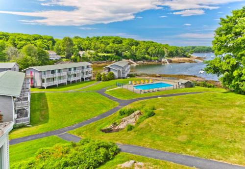 an aerial view of a house with a large yard at Smuggler's Cove Inn in Boothbay