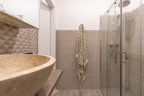 Ванная комната в Green Pearl ✰✰✰✰✰ Appartamento a 100 metri dal lago