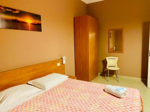 Postel nebo postele na pokoji v ubytování Angelo Apartments & Rooms