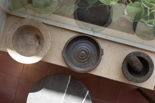 a counter with a sink and a window at Khan Ein Karem Boutique Hotel in Jerusalem