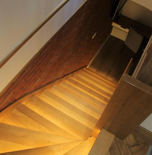 an overhead view of a flight of wooden stairs at Apartamenty4you - Apartamenty Atlantic in Sopot