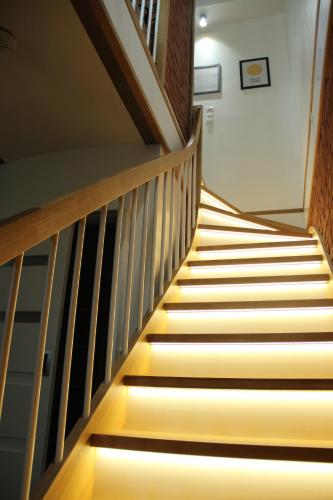 a staircase in a building with lights on it at Apartamenty4you - Apartamenty Atlantic in Sopot