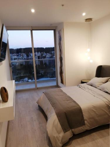 Gallery image of Suite Apartameto 1606 Espectacular Vista La Carolina, piso 16 ONE - Quito in Quito