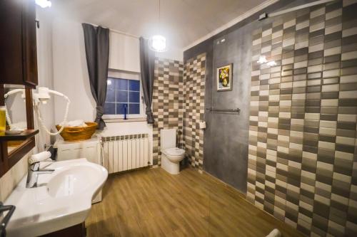 Ванная комната в SaraDa Boutique Luxury Apartment