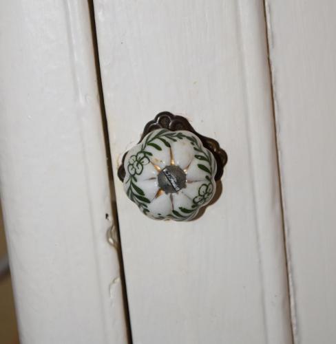 a door knob on a white door at Maria Townhouse Heart of Victoria B&B in Victoria