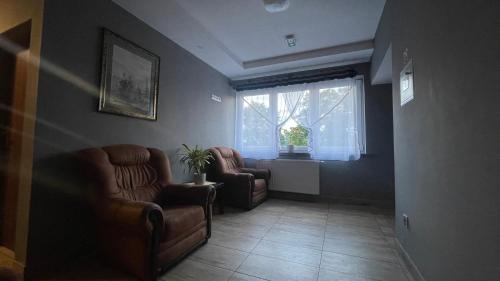 Χώρος καθιστικού στο Aparthotel WADOWICE & Hostel GENERY