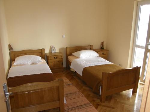 Voodi või voodid majutusasutuse Apartment in Duce with sea view, terrace, air conditioning, washing machine (595-1) toas