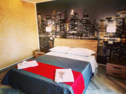a hotel room with a bed with a view of a city at Central Campobasso in Campobasso