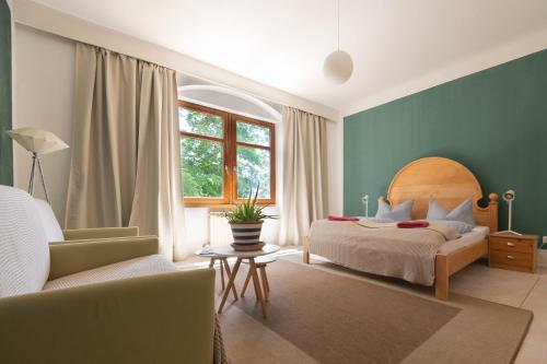 Posteľ alebo postele v izbe v ubytovaní Absteige Innsbruck- Zentrale Ferienapartments