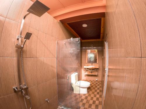 Koupelna v ubytování New Breeze Thoddoo Inn