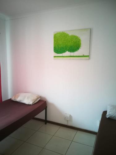 Ένα ή περισσότερα κρεβάτια σε δωμάτιο στο 4ways Youth Hostel
