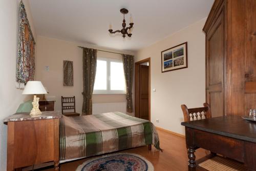 Ένα ή περισσότερα κρεβάτια σε δωμάτιο στο Chambres d'hôtes Gilles Schneider