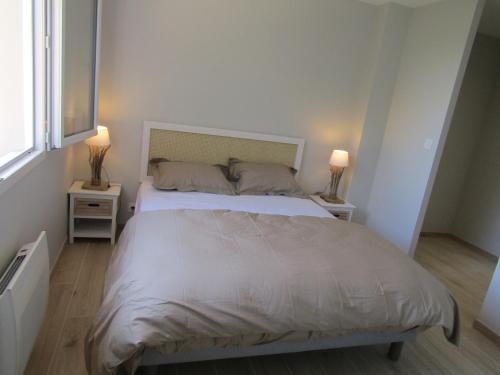 En eller flere senge i et værelse på villa luxe et spa
