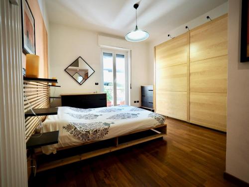 Ένα ή περισσότερα κρεβάτια σε δωμάτιο στο DIMORA MARTINETTI (FIUMARA/SCASSI) - GENOVABNB it