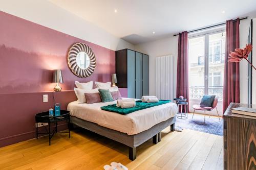 Säng eller sängar i ett rum på Sweet Inn - Rue de Cerisoles