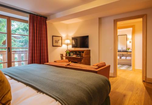 
A bed or beds in a room at Chalet Griffin
