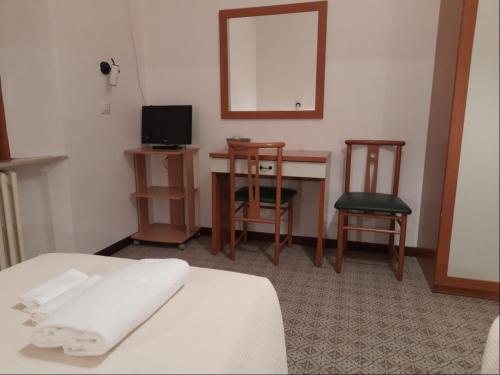 TV a/nebo společenská místnost v ubytování Albergo Italia