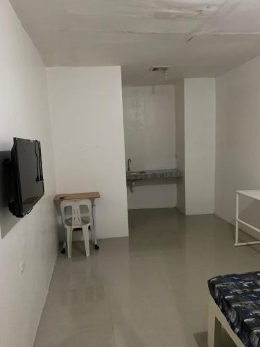 Una televisión o centro de entretenimiento en La Riesa Dorm
