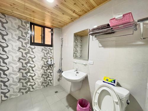 Vannituba majutusasutuses Qilixiang Homestay