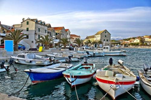 a group of boats are docked in a harbor at Holiday Home Primosten (54) in Primošten