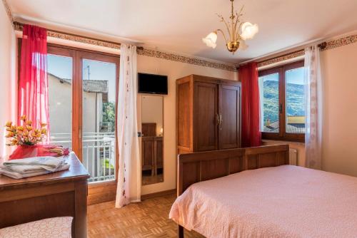 Postel nebo postele na pokoji v ubytování Ciclamino Standard Vittoria