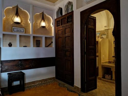 an entrance to a room with an open door at Riad Charme d'Orient Adults Only in Marrakech