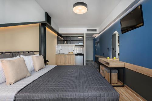 Ένα ή περισσότερα κρεβάτια σε δωμάτιο στο Bemyguest Comfort Pidna