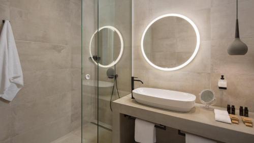 a bathroom with a sink and a glass shower at Villa Noble 2 by Villas Holiday in Bale