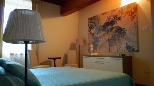 Ένα ή περισσότερα κρεβάτια σε δωμάτιο στο Agriturismo Corte Speranza