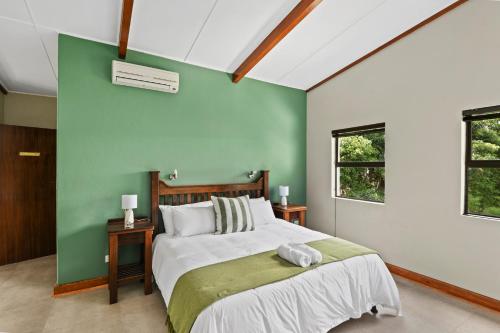 מיטה או מיטות בחדר ב-De Akker Guest House
