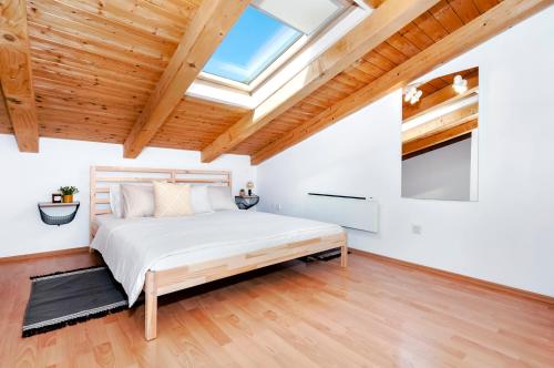 Postel nebo postele na pokoji v ubytování Casa San Benussi