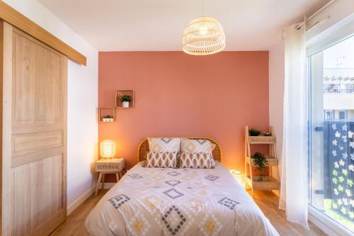 a bedroom with a bed and a large window at Le Duplex - Disneyland - Rooftop - Wifi in Montévrain