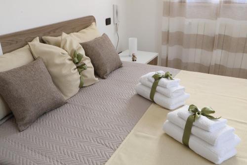 Letto o letti in una camera di PALAZZO ANGIO'