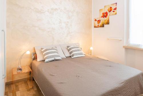 Giường trong phòng chung tại CASA DIAMANTE - Regarda Travel