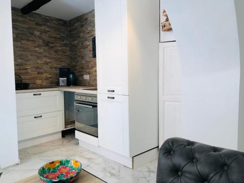 Kuchyň nebo kuchyňský kout v ubytování Apartment la Grotta Pizzo