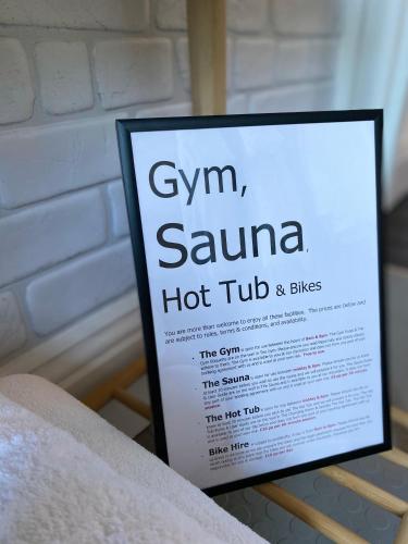 a sign sitting on top of a table at The Devonian in Ilfracombe