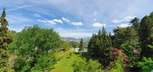 an overhead view of a park with trees and grass at Parador de Cazorla in Cazorla